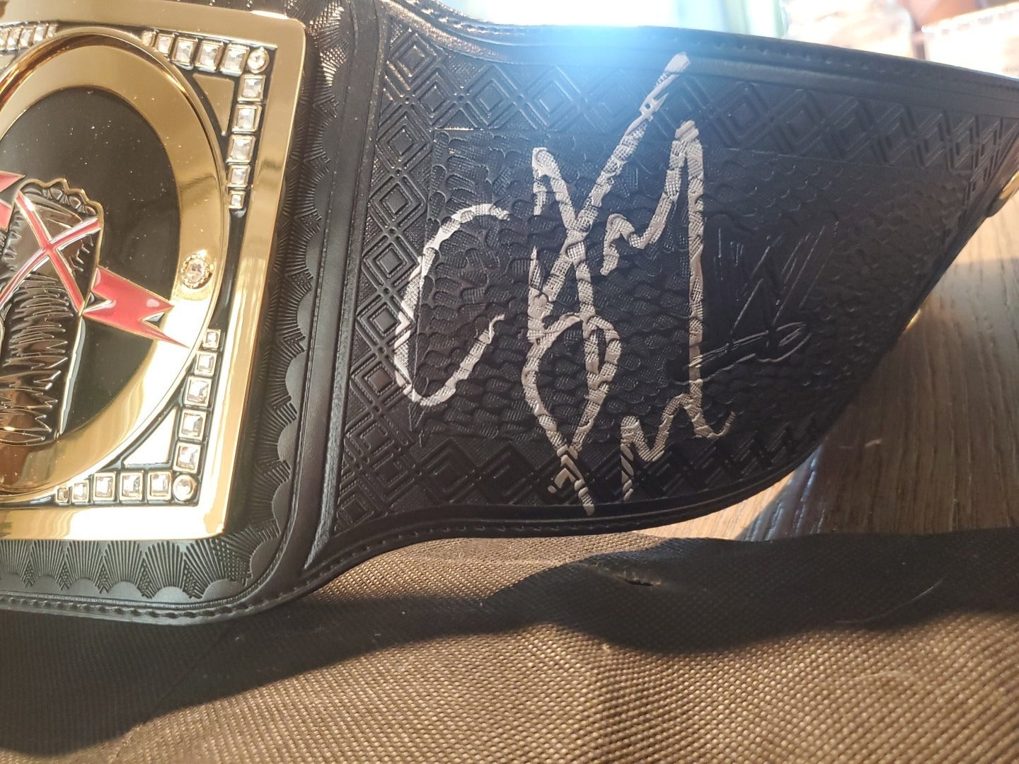WWE REPLICA TITLE BELT  SCRATCH LOGO BY CM PUNK !!